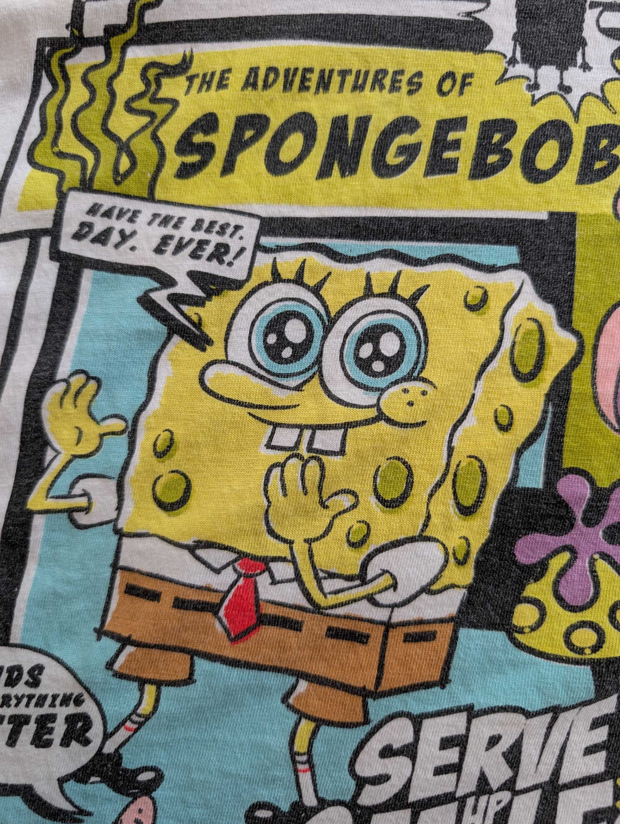Biała kolorowa bluzka z krótkim rękawem Sponge Bob Sinsay 134