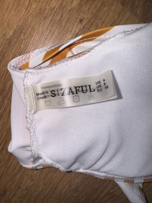 Жіночий смугастий купальник