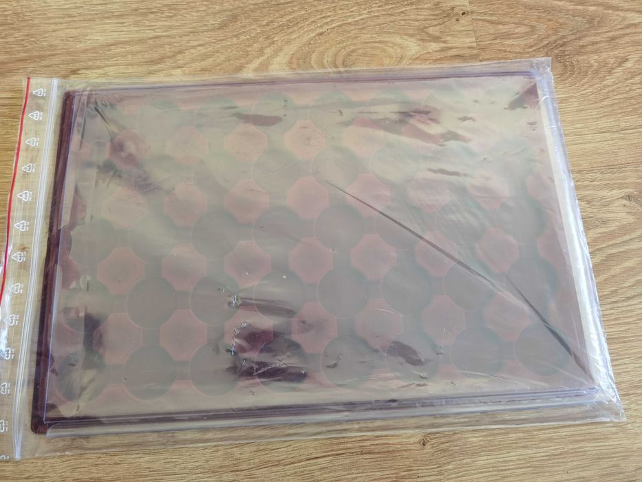 Nieużywana paleta, album na monety bilony.