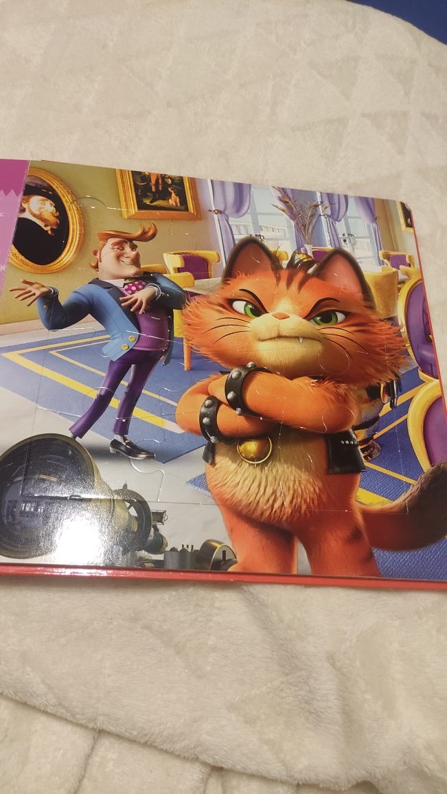 Książka 44 koty z puzzlami