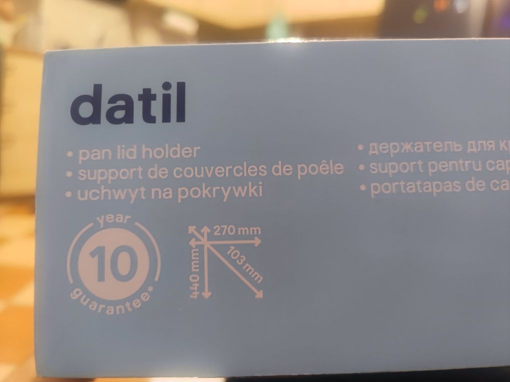 Uchwyt na pokrywki, nowy, chromowany