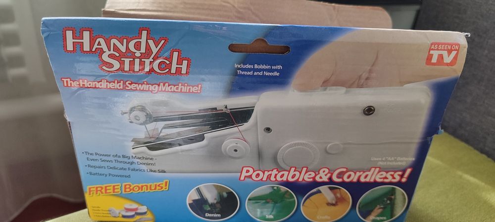 Портативная швейная машинка.