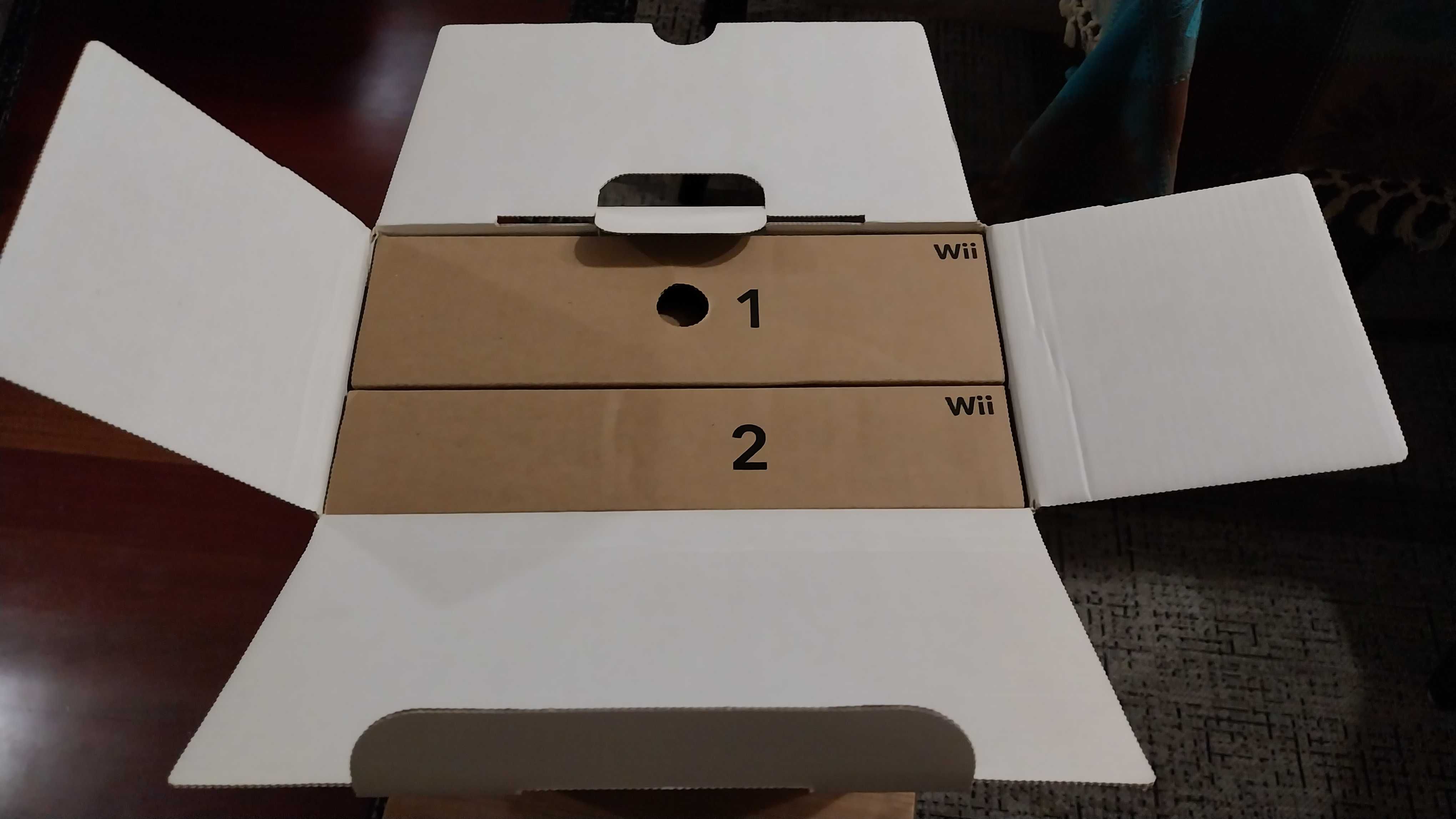 Caixa Nintendo Wii Family  com acessórios e dois jogos