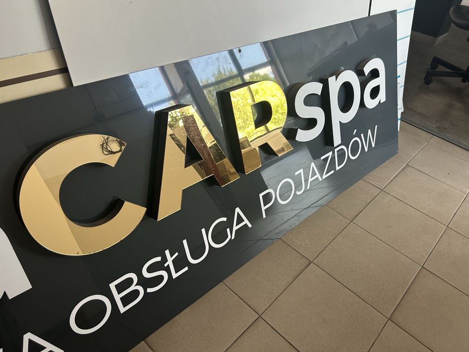Szyld reklamowy zlote litery