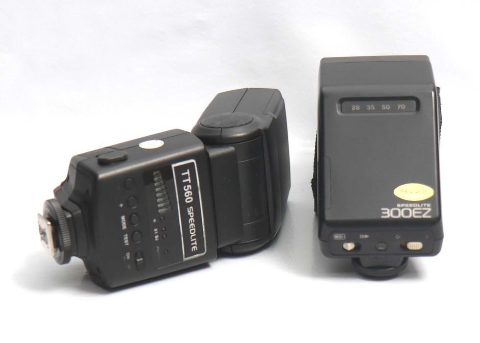 Flashes Neewer TT560 Speedlight e Canon Speedlite 300EZ (Não ligam)