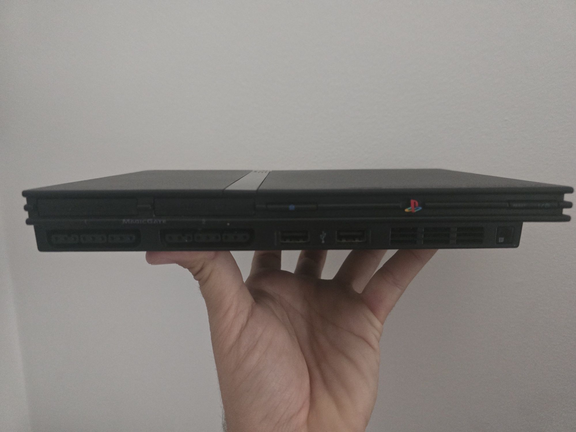 Playstation 2 slim (ps2) + comando + eyetoy + jogos