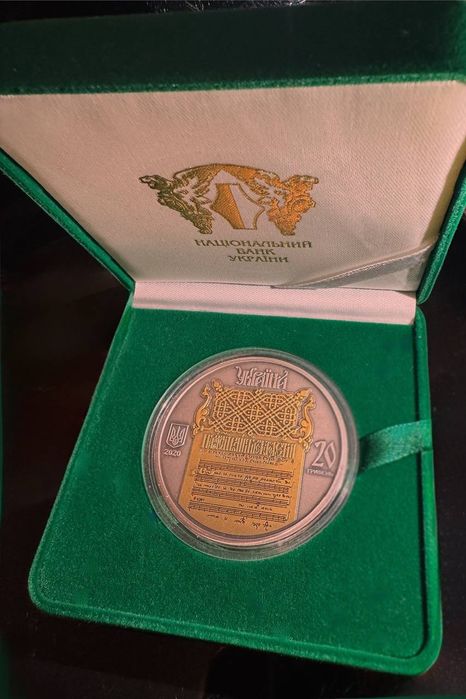 Срібна монета “Україна — Білорусь. Духовна спадщина — Ірмологіон”