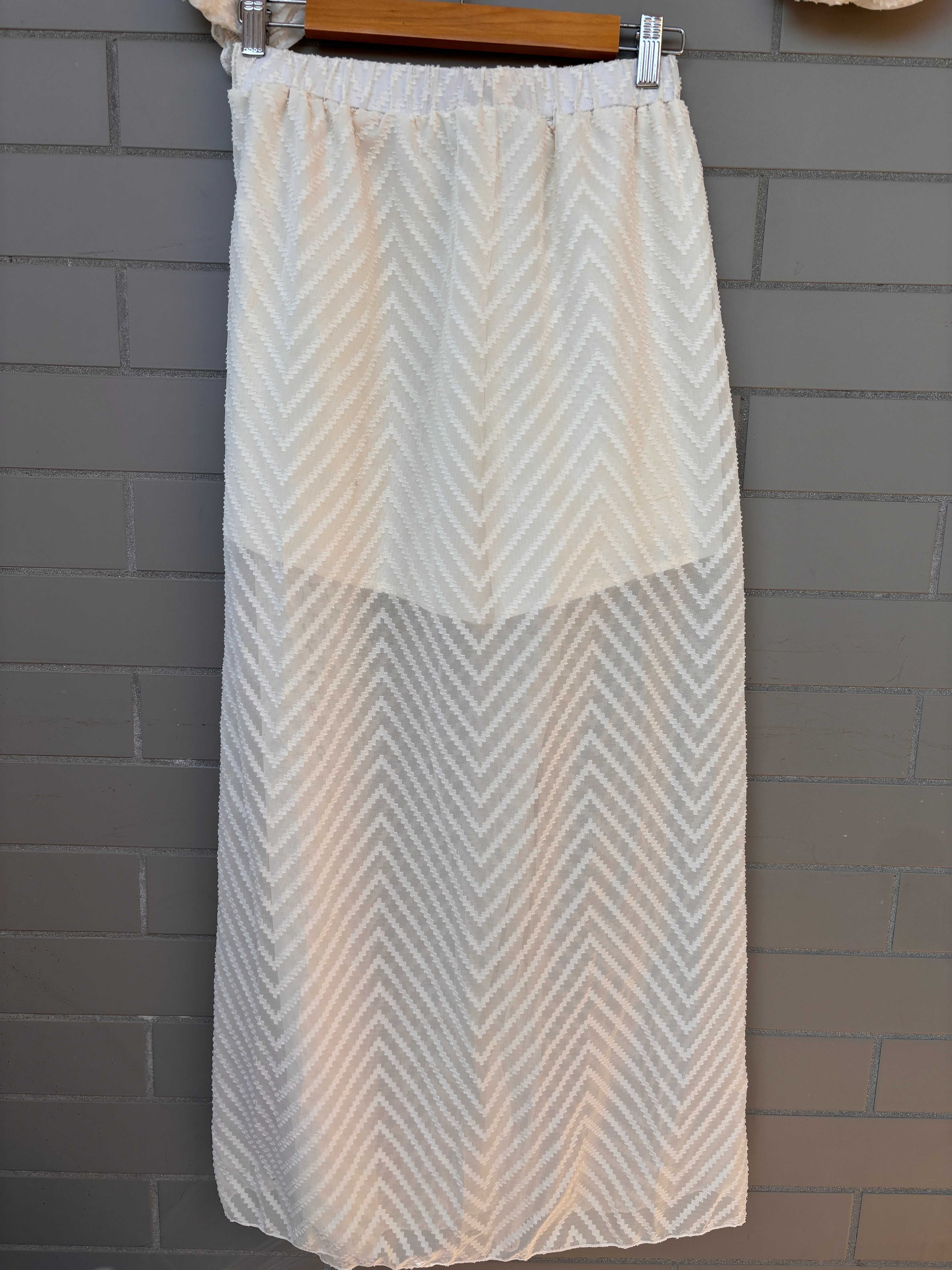 Conjunto top e saia-calção novo
