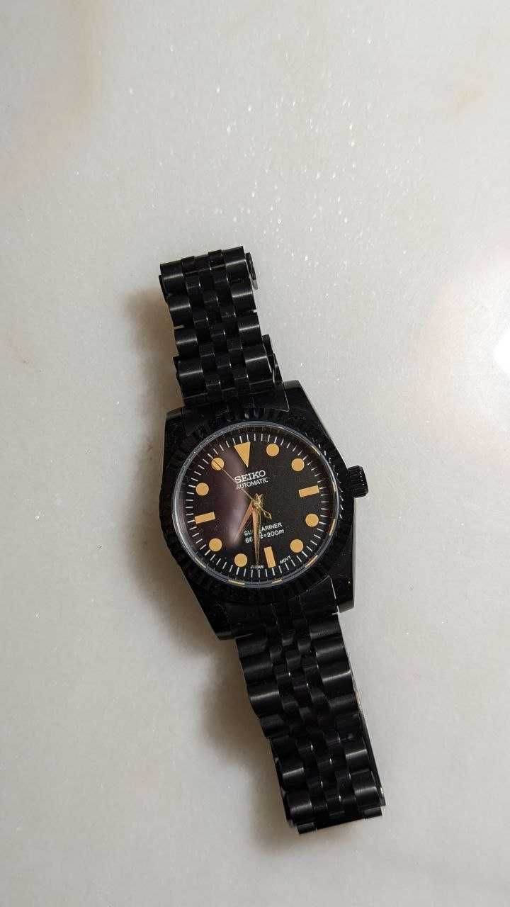 Seiko Preto e dourado