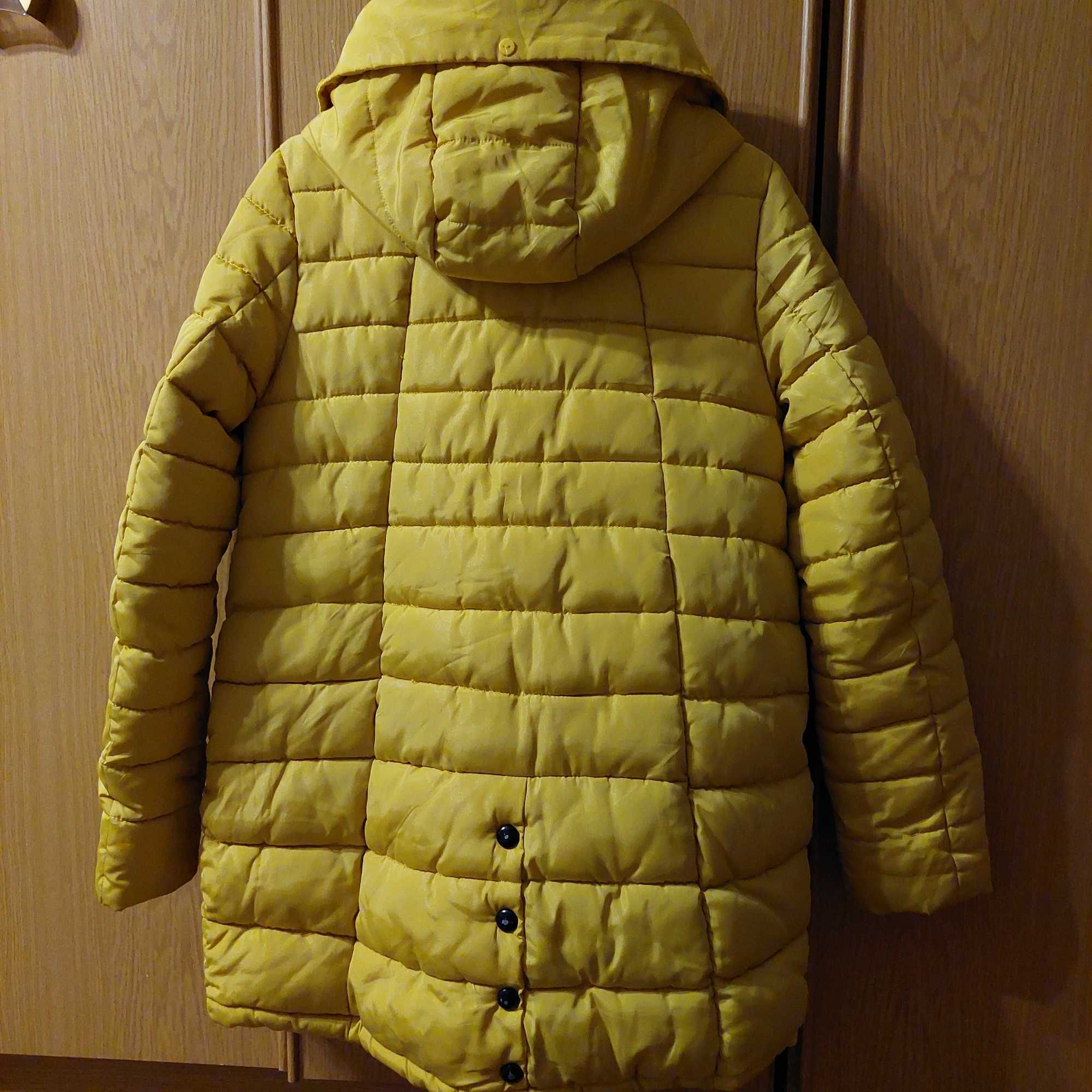 Продам  жіночу зимову куртку(пуховик)