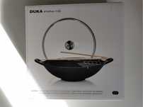 Żeliwny wok firmy Duka