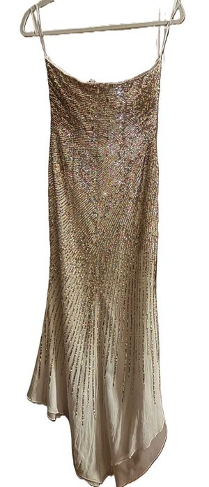 suknia  balowa lub ślubna  z trenem w pastelowe  cekiny model syrena