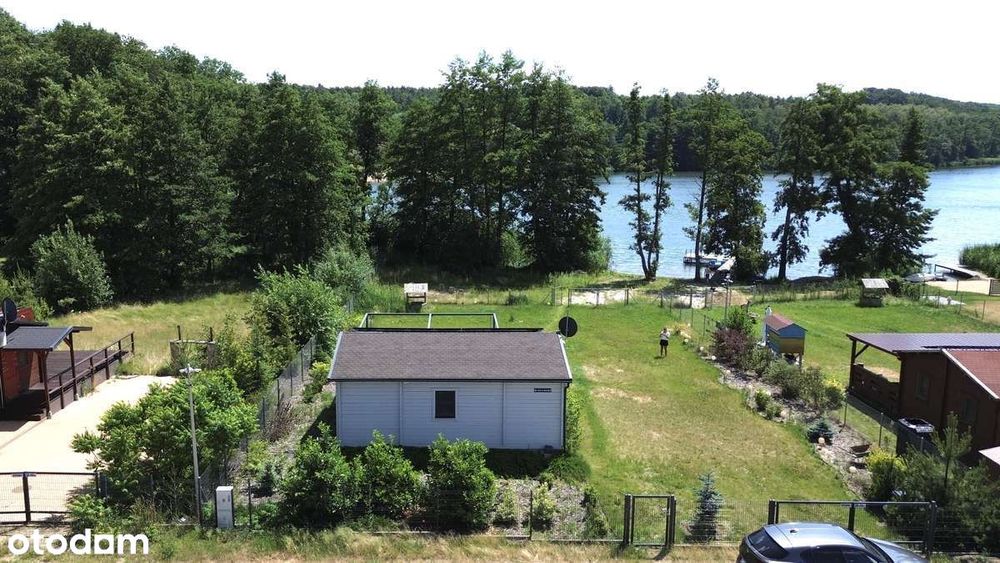 Dom całoroczny z własnym dostępem do jeziora, pomostem i plażą.Olandia