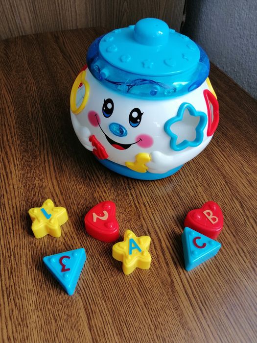 Игрушка поющий горшочек