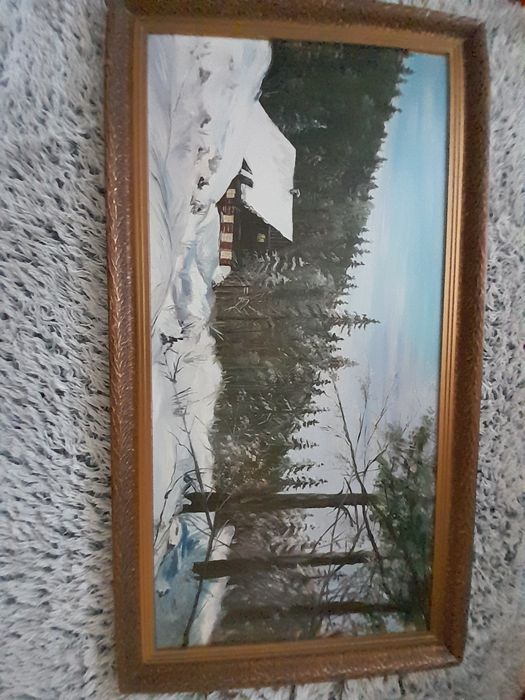 Obraz przedstawiający zimową chatę.