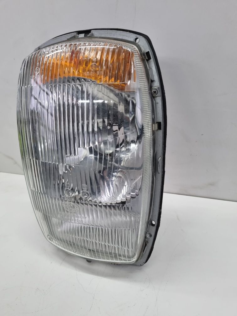 mercedes w114 w115 reflektor lampa nowy oryginalny hella