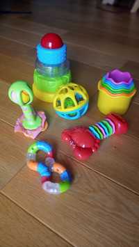 Zestaw zabawki kreatywne grzechotka kręciołek wieża gryzak piłka