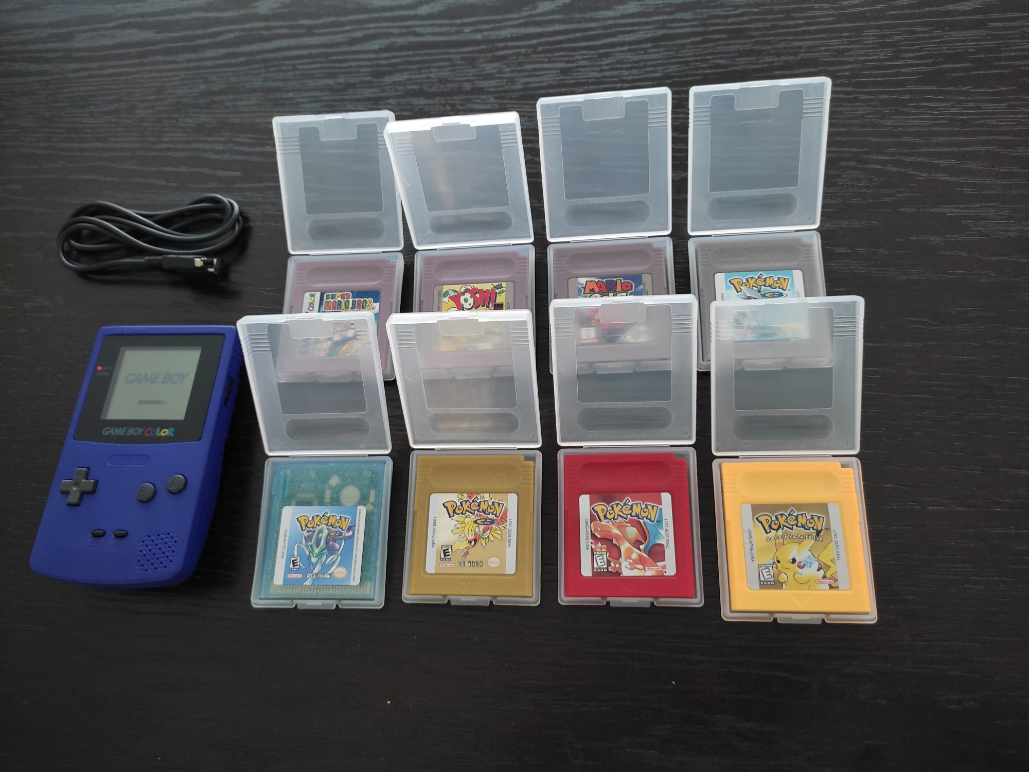 Conjunto Gameboy Color roxo com 8 jogos e cabo link