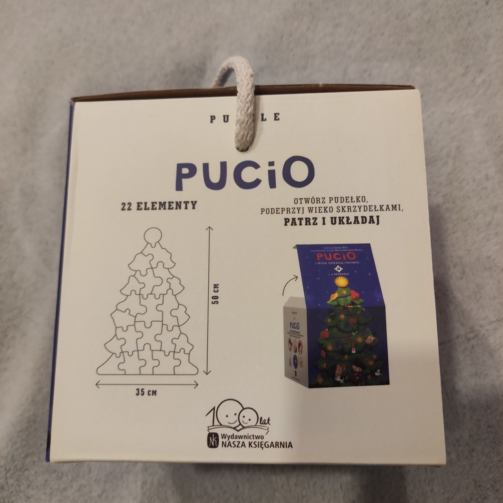 Puzzle pucio i misia ubierają choinkę