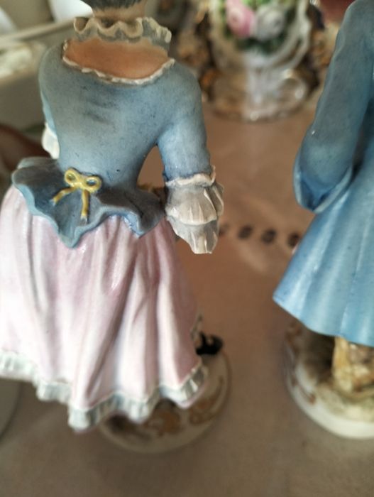 Par de figuras - Artibus