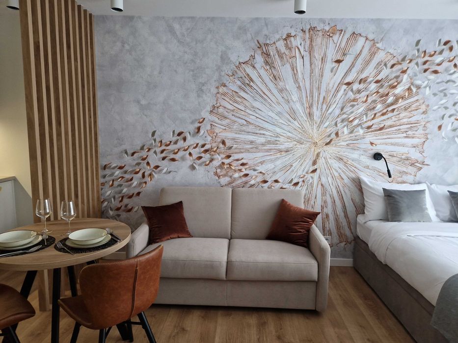 Apartament z bezpłatnym parkingiem i ogródkiem