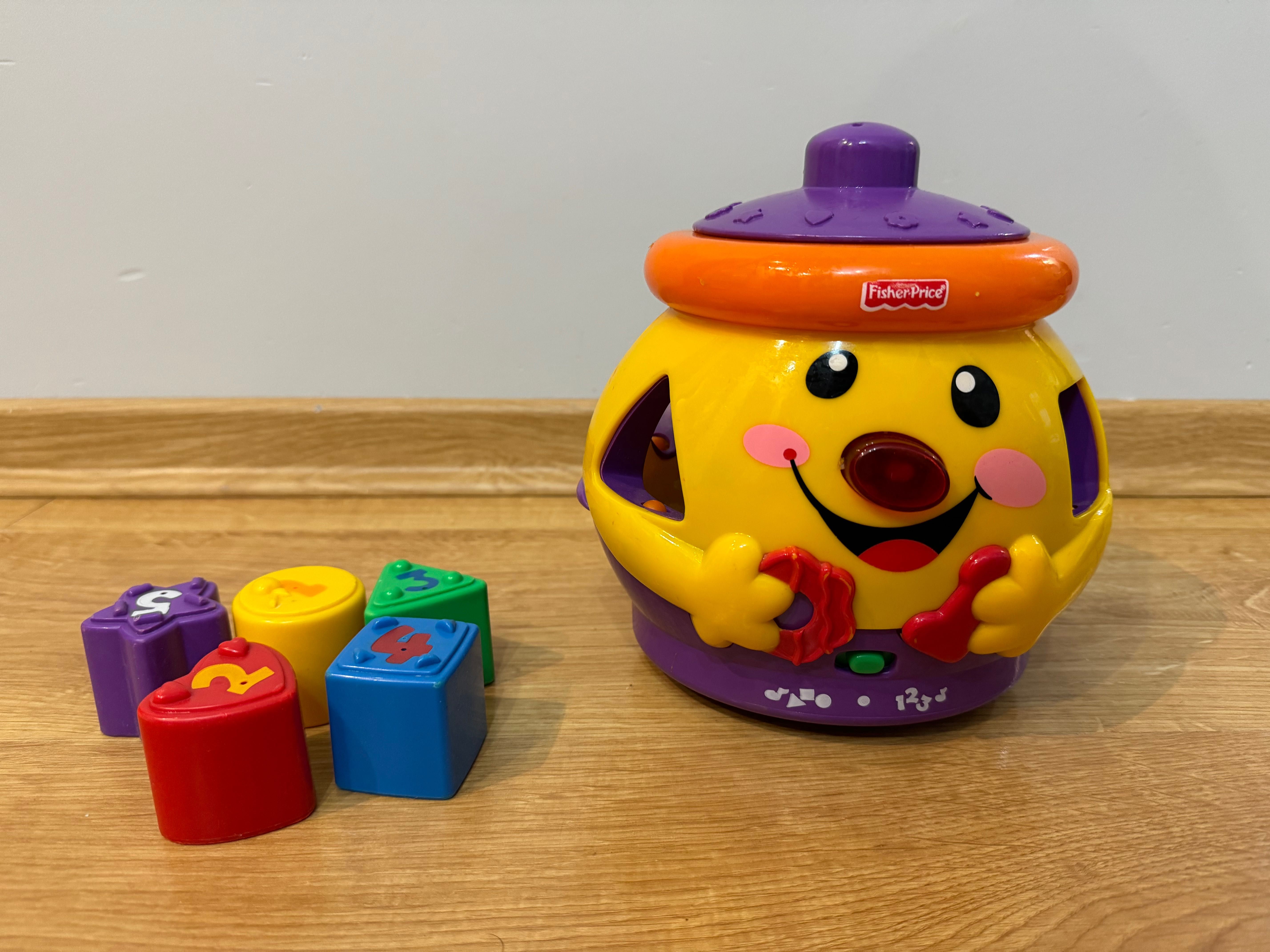 Interaktywny garnuszek Fisher Price