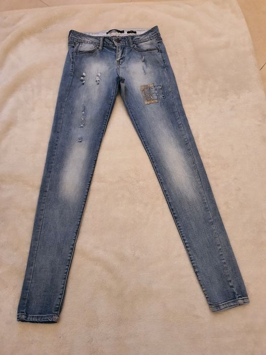 Spodnie dżinsy przetarcia Reserved W27 L32