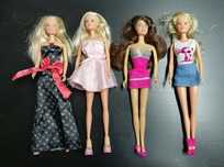 4 bonecas Barbie