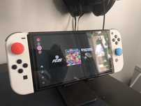 Nintendo Switch OLED *Desbloqueada* + acessórios