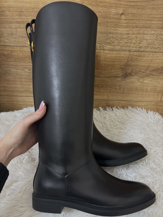 Продам сапоги новые кожа