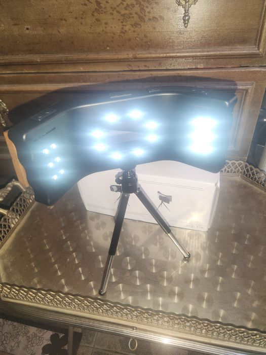 Suporte com tripé para telemóvel