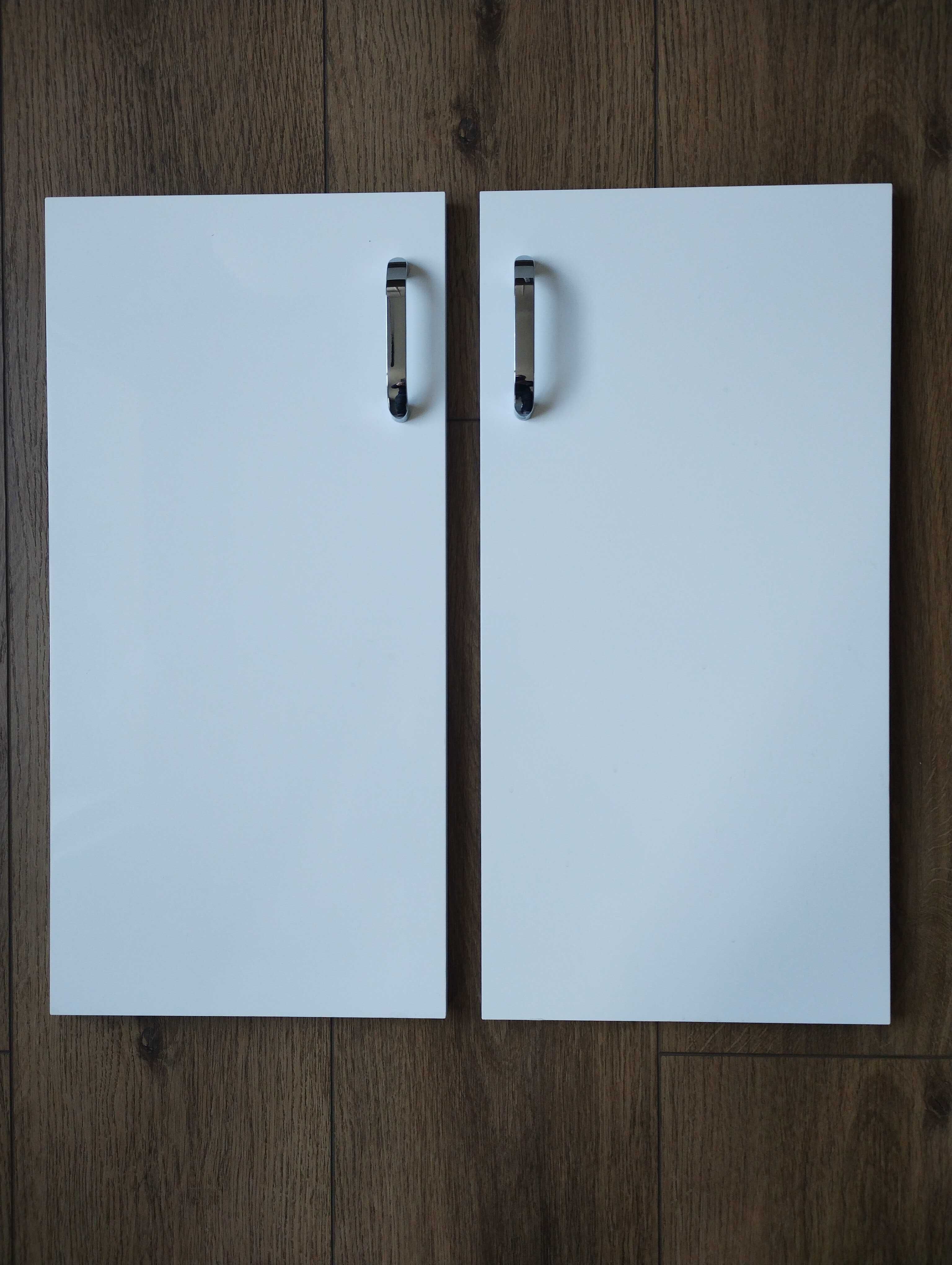 Dwa fronty do szafki łazienkowej 28 x 56 cm białe wysoki połysk