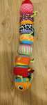 Tomy gąsienica lamaze rzepy i jeżyk sensoryczny Fisher price