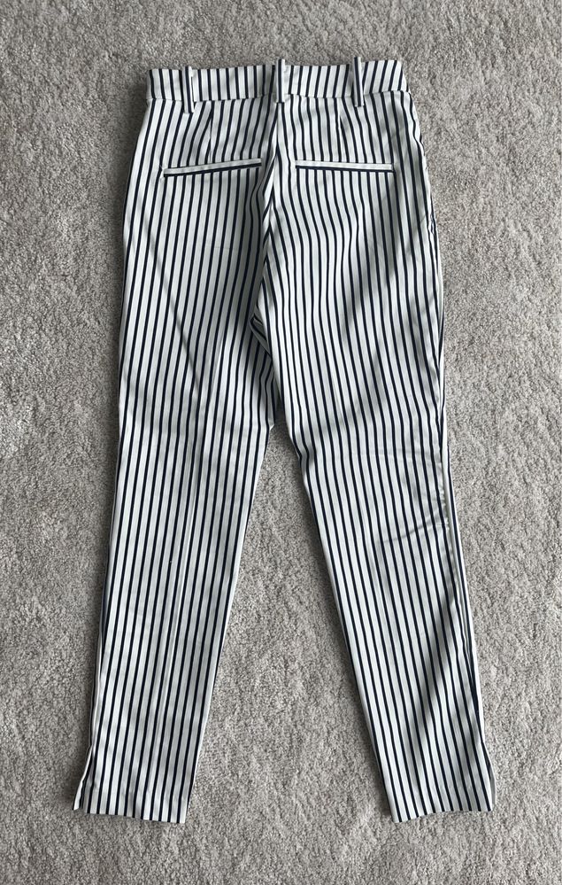 Nowe, eleganckie spodnie w pasy H&M, rozmiar 34