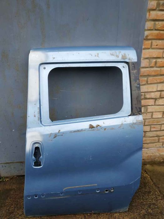 Fiat/Alfa/Lancia Doblo 09- двері сдвижная L DR6