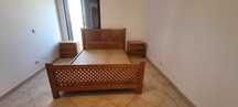 Cama de casal em madeira