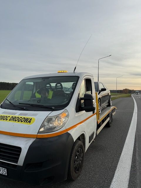 Pomoc drogowa laweta wynajem holowanie