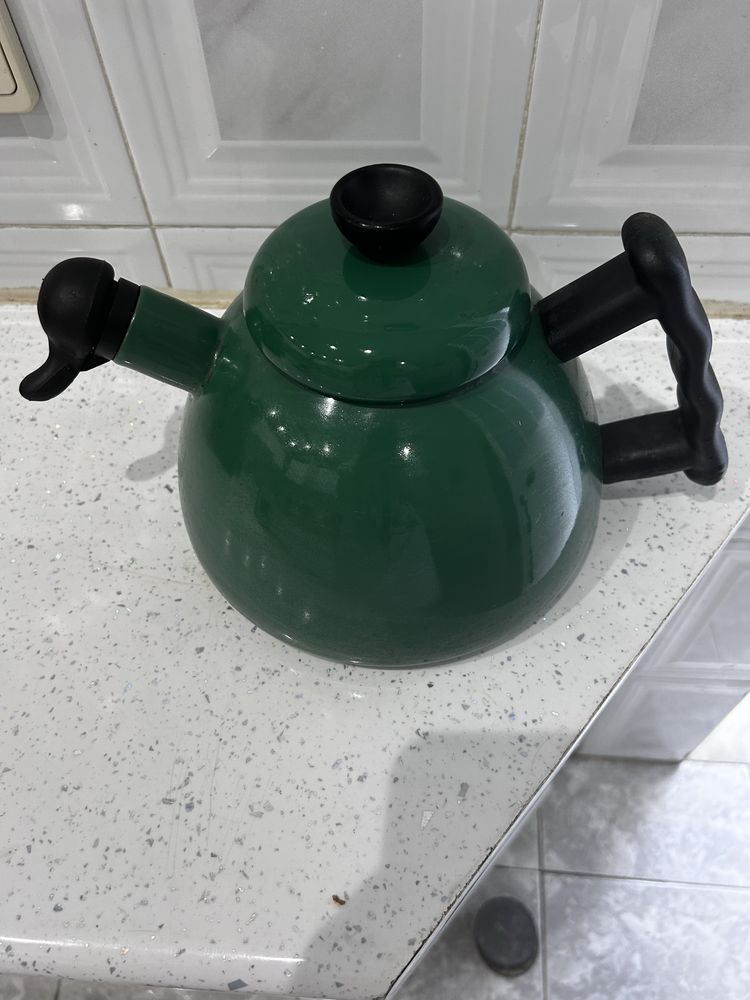 Chaleira de aquecer no fogao