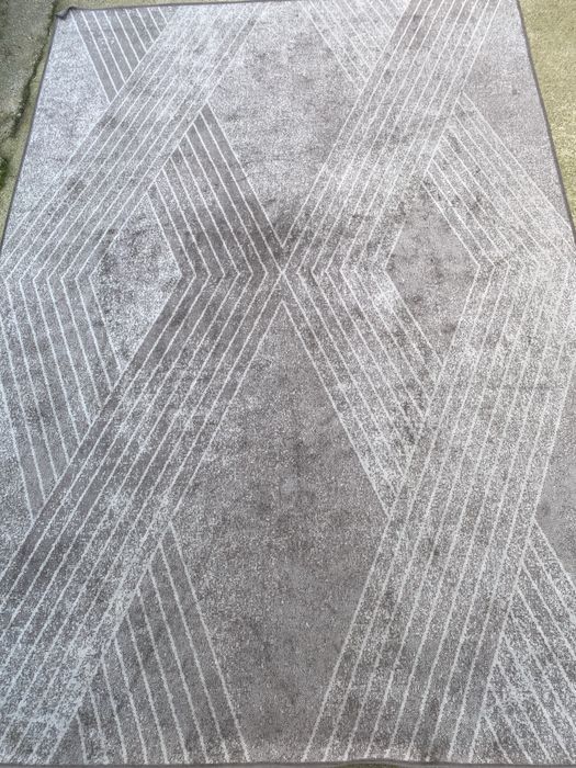 Venda de tapete cinzento