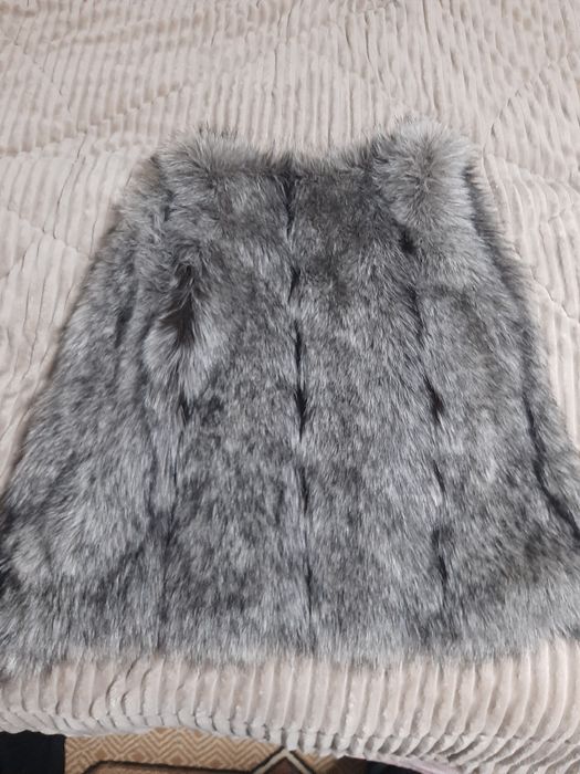 Меховая жилетка женская