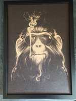 Małpa z papierosem plakat oprawiony w czarną ramę 39*55