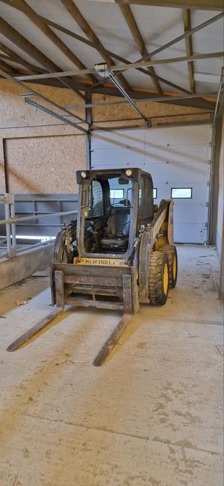 Фронтальний навантажувач New holland l216