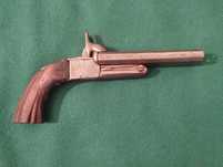 Pistola de cano duplo tipo Lefauchaux 1860.