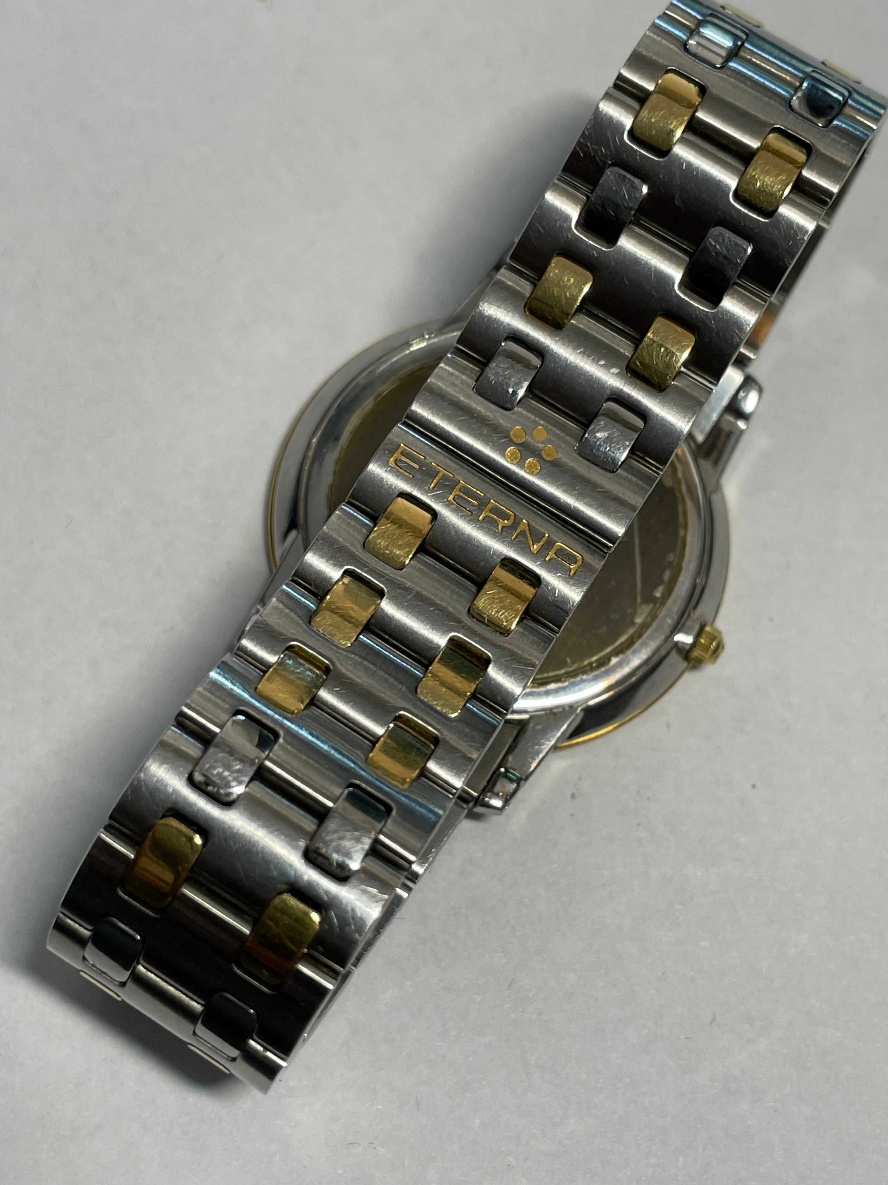Eterna 3000.47 Szwajcarski zegarek kwarcowy pozłacany 18kt