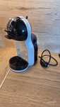 Ekspres kapsułkowy De'Longhi Dolce Gusto + wielorazowe kapsułki