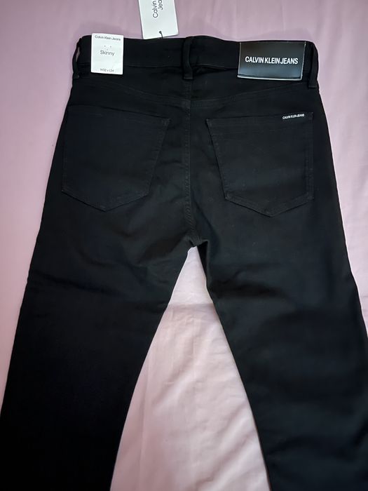 Wyprzedaż spodnie męskie Calvin Klein Jeans.