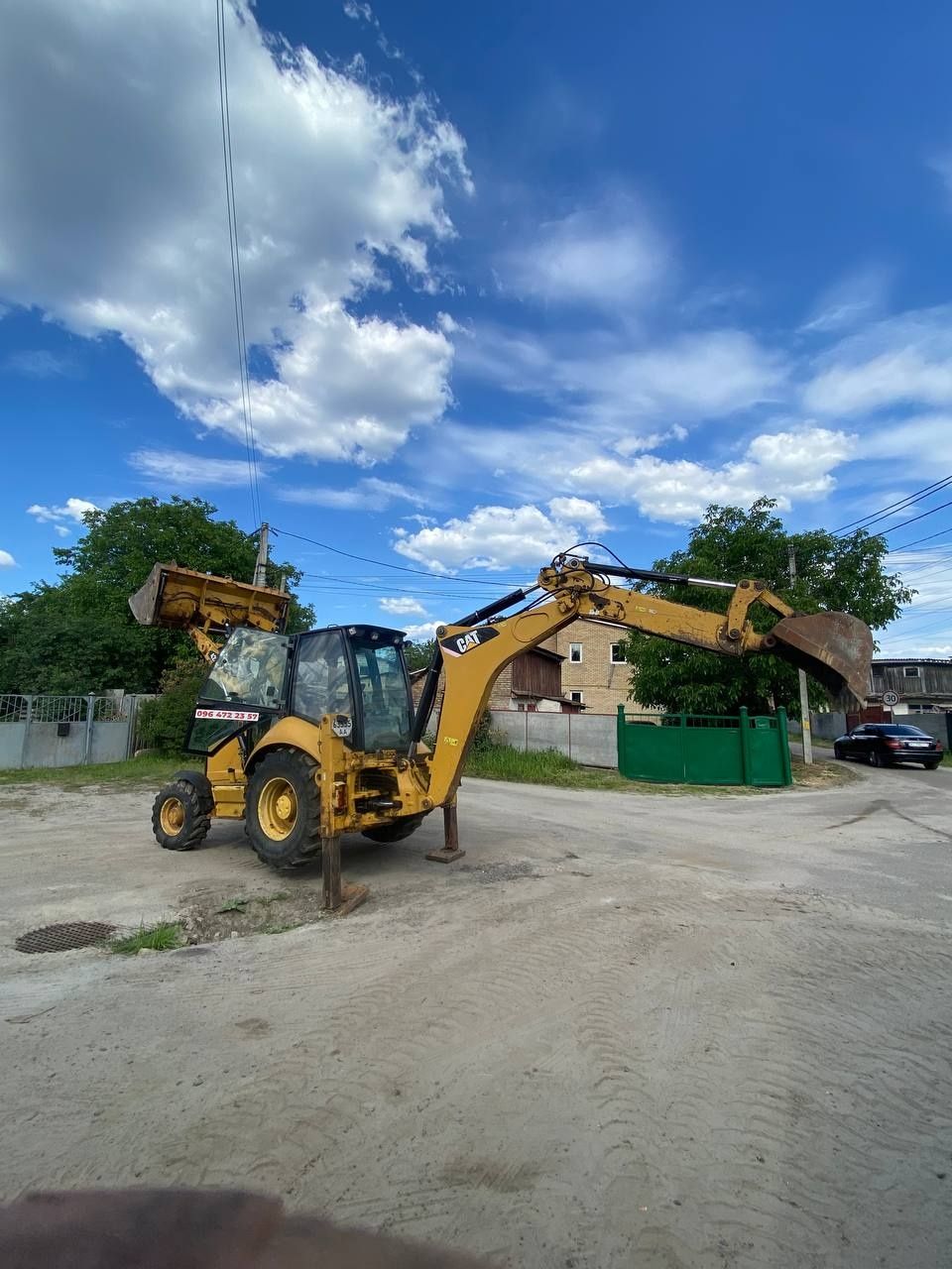 Ескаватор навантажувач Caterpillar 428E