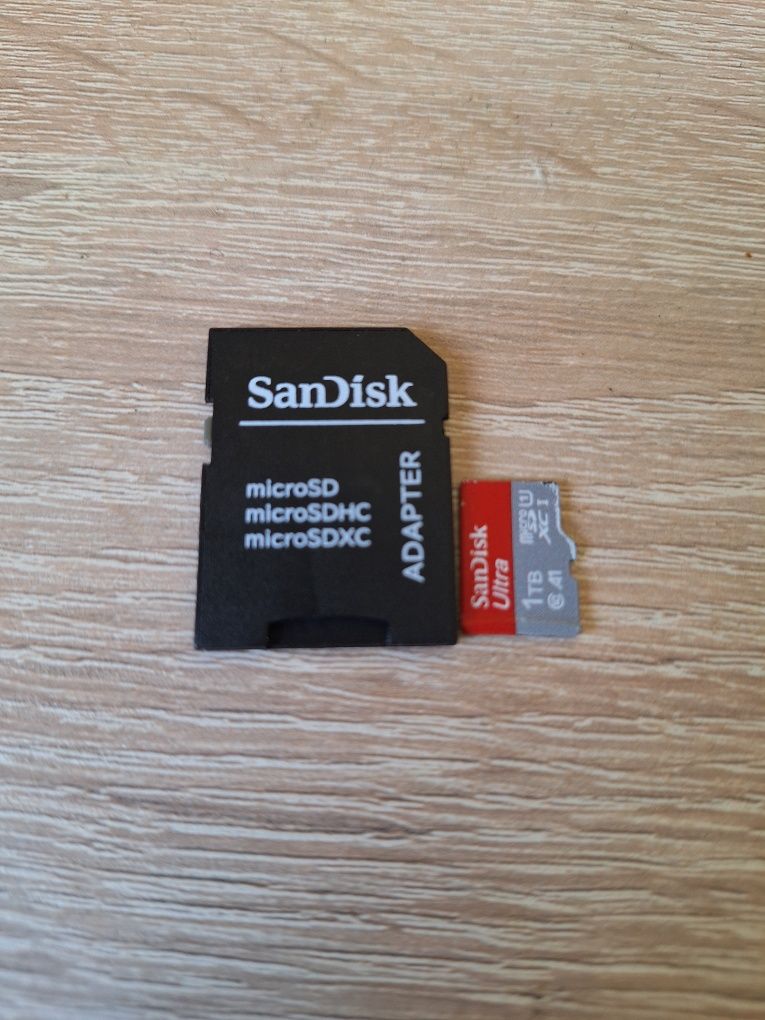 Karta pamięci SD 1 tb Sandisk dwie sztuki z adapterem i inną karta.