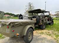 Jeep Willys 1957 with a trailer