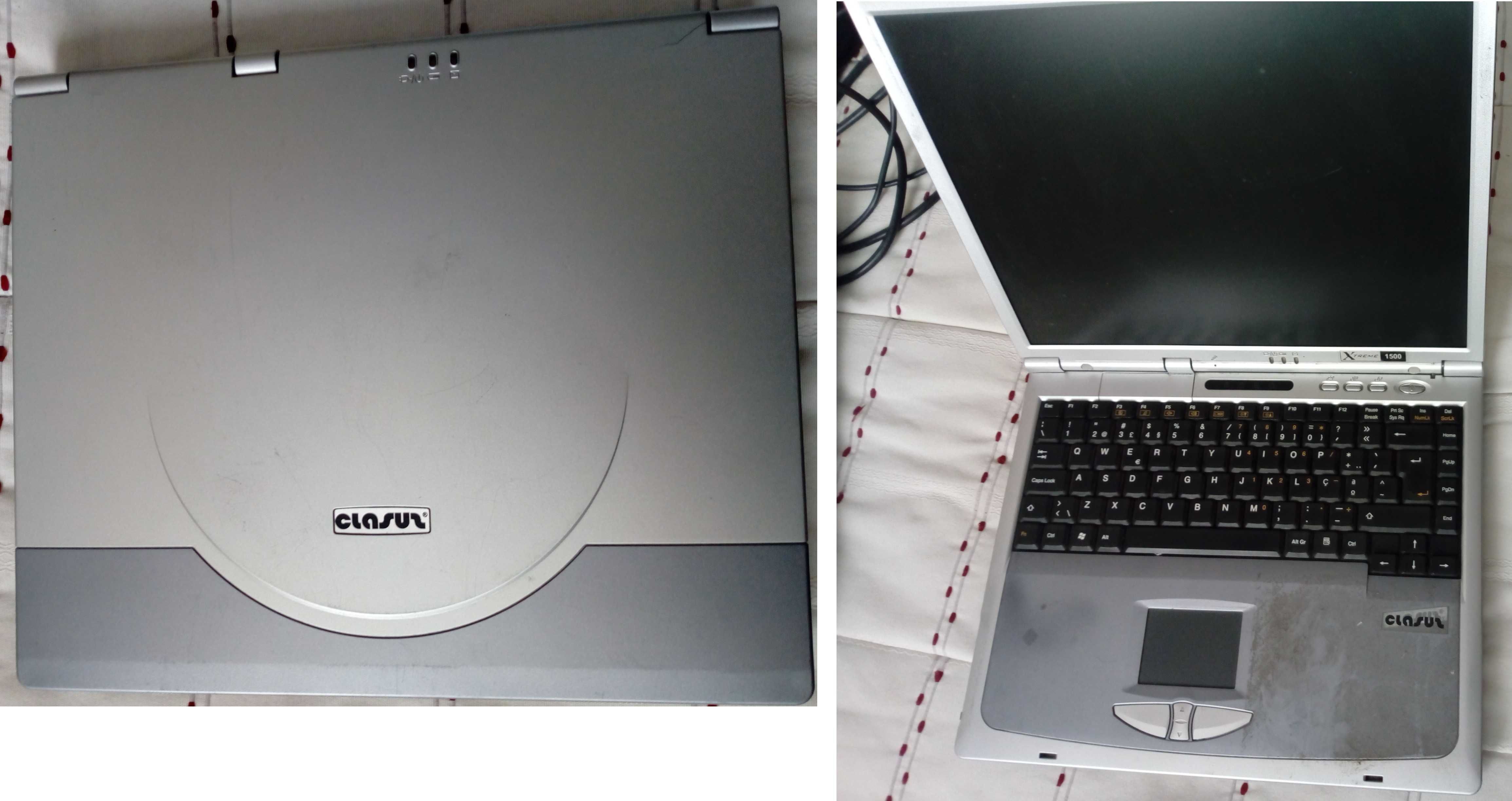Portátil muito antigo com leitor de disquetes e de DVD